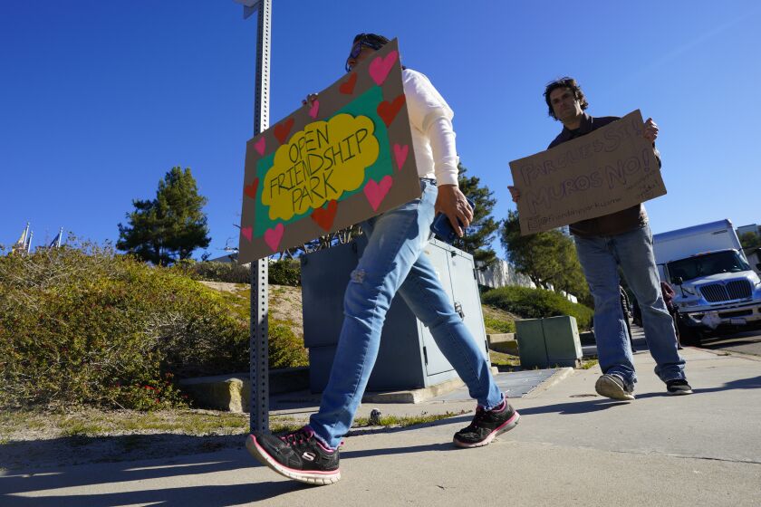 Chula Vista, CA - January 24: More than a dozen demonstrators who walked in front of the San Diego Sector, U.S. Border Patrol office on Tuesday, Jan. 24, 2023 in Chula Vista, CA. The group was peacefully demonstrating that their voice has not been heard regarding plans for new construction at Friendship Park on the U.S. Mexico border. (Nelvin C. Cepeda / The San Diego Union-Tribune)