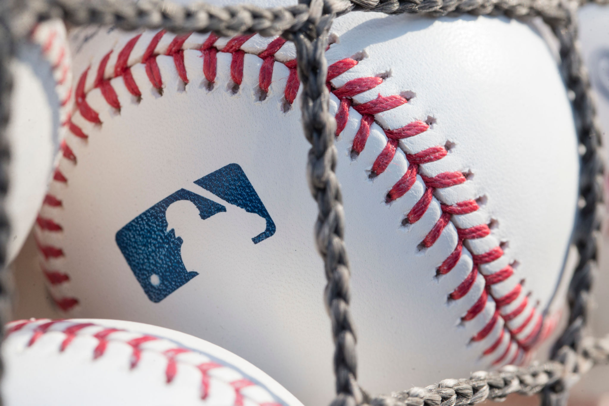 A baseball with MLB logo.