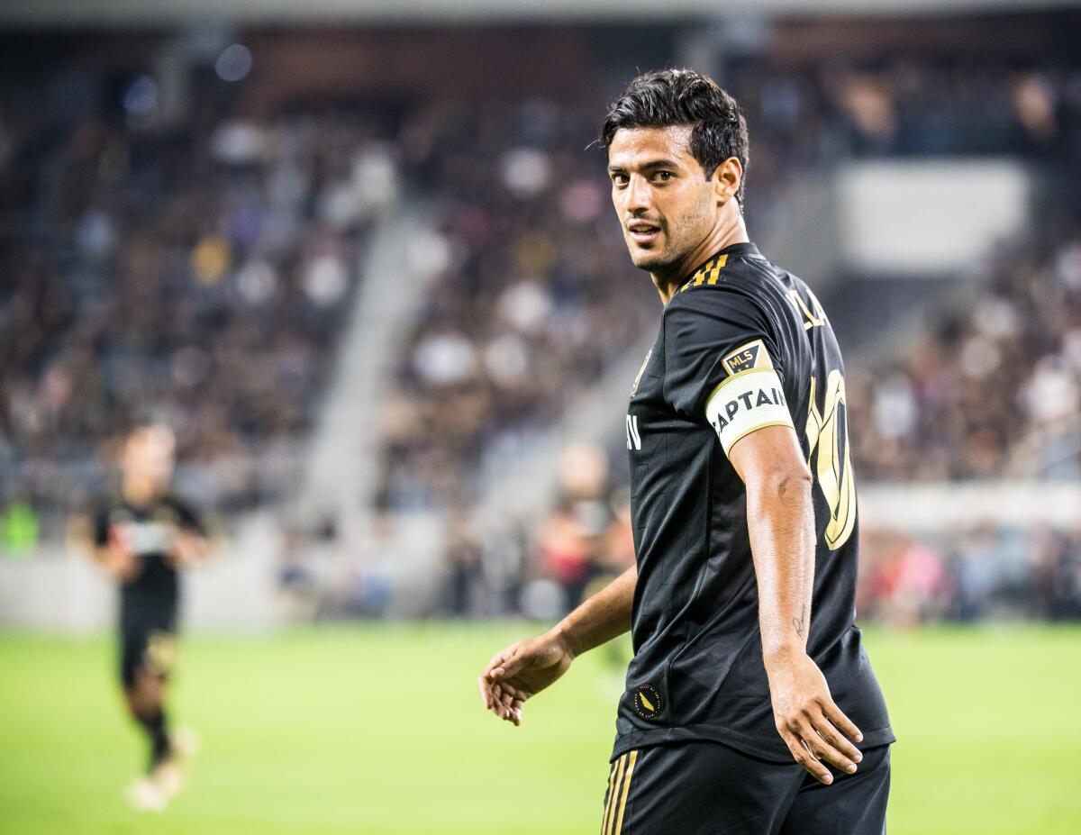LAFC's Carlos Vela looks on during an MLS game.