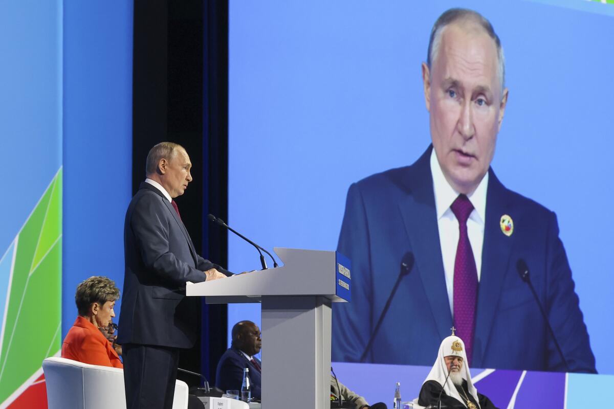 Russian President Vladimir Putin addresses a forum in St. Petersburg
