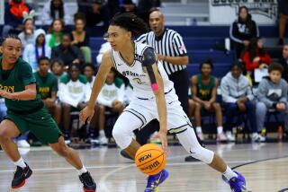 Sophomore Elzie Harrington of St. John Bosco contributed key points late in 52-48 win over LB Poly.