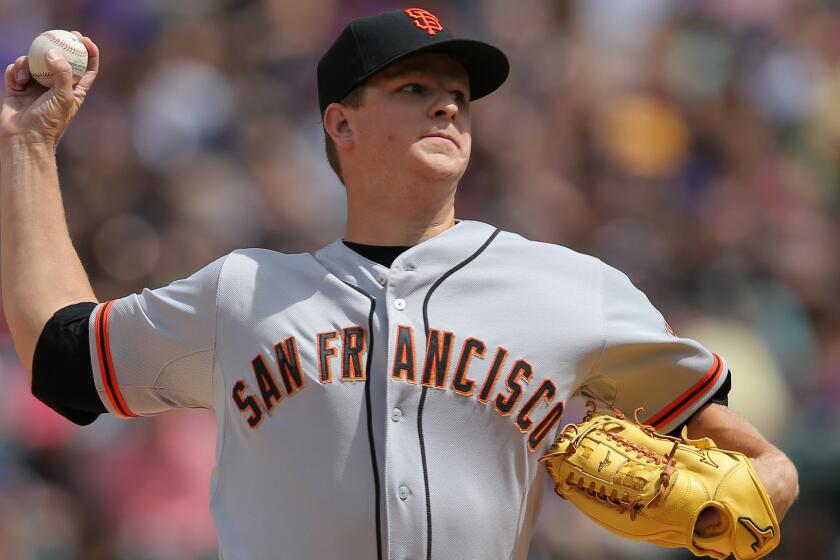 San Francisco Giants pitcher Matt Cain delivers a pitch during a game against the Colorado Rockies in April.