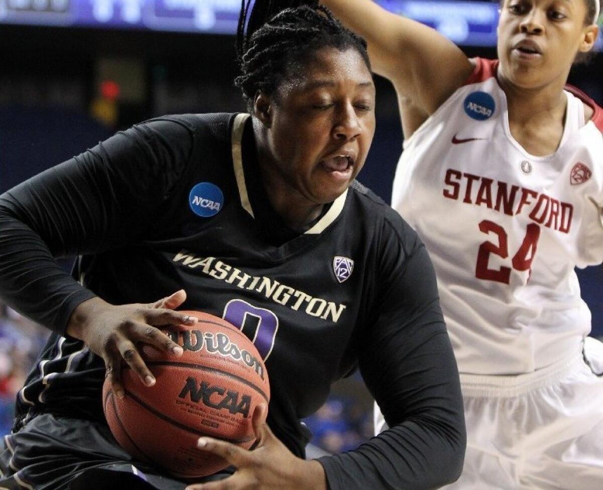 Washington's Chantel Osahor, left, pulls down a rebound near Stanford's Erica McCall (24) during a regional final women's college basketball game in the NCAA Tournament in Lexington, Ky., Sunday, March 27, 2016. (AP Photo/James Crisp)