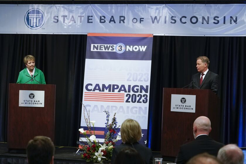 FILE - Wisconsin Supreme Court candidates Republican-backed Dan Kelly and Democratic-supported Janet Protasiewicz participate in a debate Tuesday, March 21, 2023, in Madison, Wis. The winner of the high stakes contest between Kelly and Protasiewicz will determine majority control of the court headed into the 2024 presidential election. (AP Photo/Morry Gash, File )
