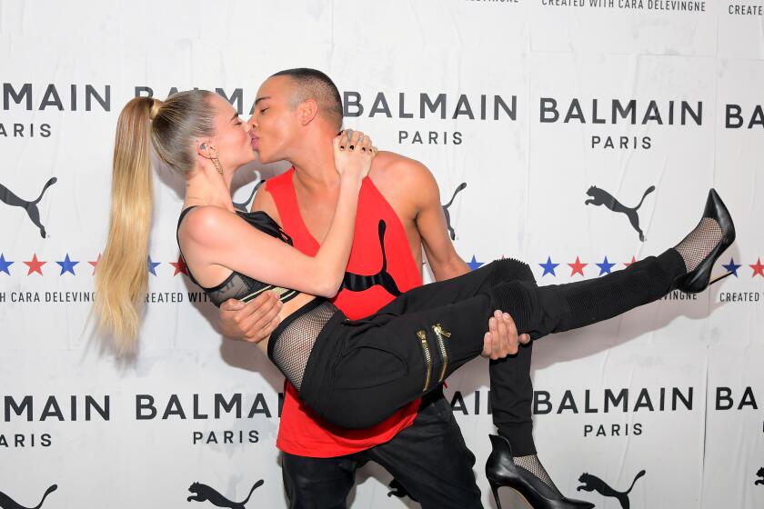 LOS ANGELES, CALIFORNIA - NOVEMBER 21: (L-R) Cara Delevingne and Balmain Creative Director Olivier Rousteing attend PUMA x Balmain created with Cara Delevingne LA Launch Event at Milk Studios on November 21, 2019 in Los Angeles, California. (Photo by Charley Gallay/Getty Images for PUMA)