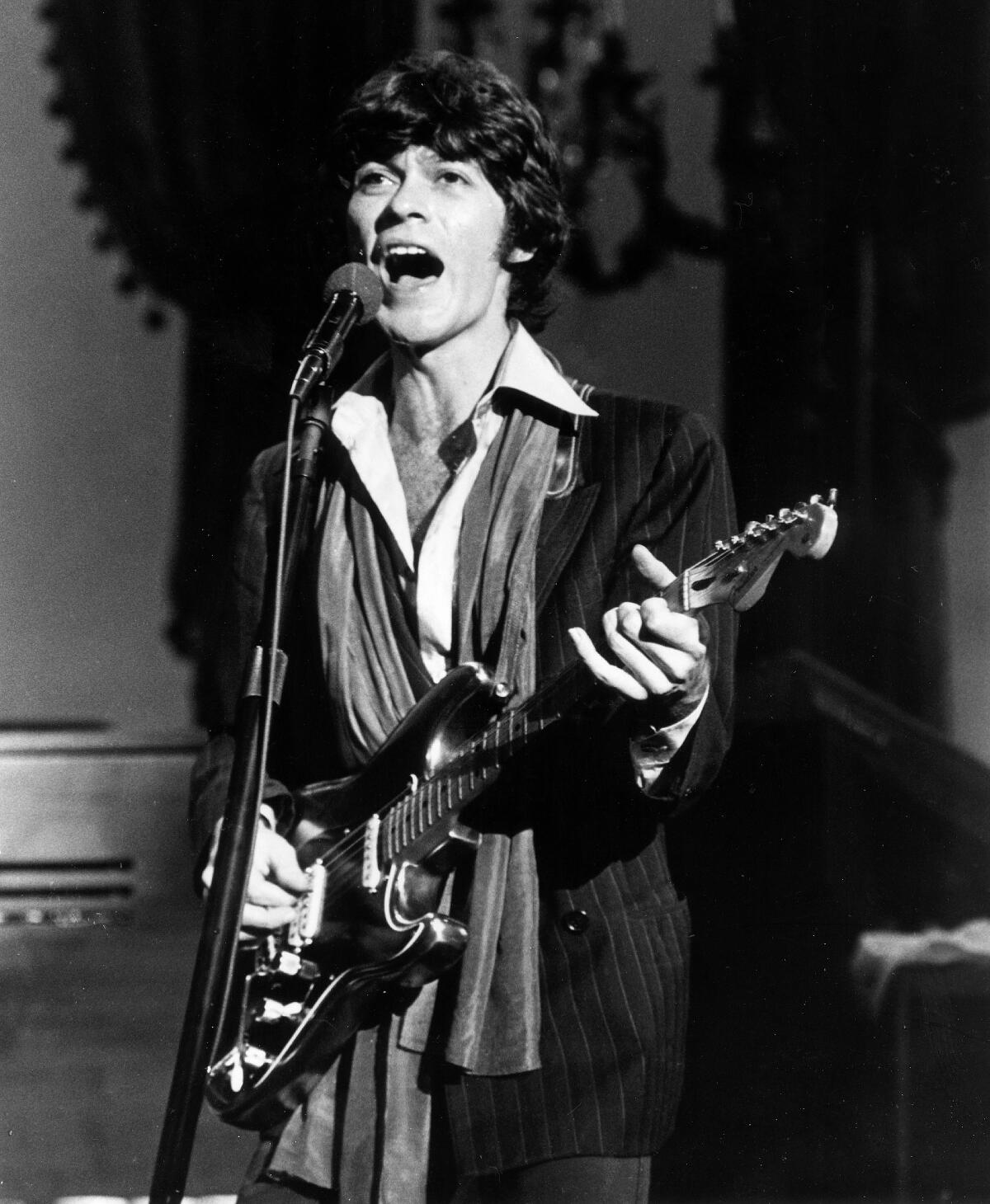Robbie Robertson performing in the 1978 concert film "The Last Waltz."