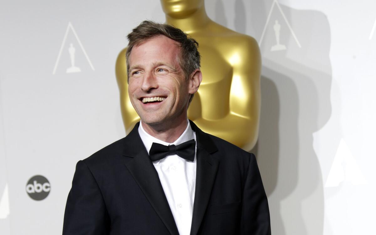 Spike Jonze in the press room after winning the Oscar for original screenplay on Sunday.