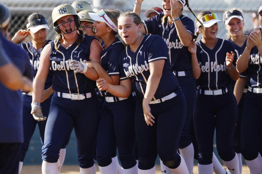 San Diego, CA - May 30: Del Norte's Alexa Brunetti, left, celebrates a home run against Valley View in the Division 1 Southern California Regional semifinal game on Thursday May 30, 2024. (K.C. Alfred / The San Diego Union-Tribune)
