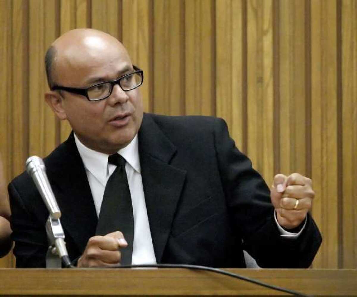 Truck driver Marco Costa answers defense questions by his attorney Edward Murphy on Monday, July 11, 2011, during his trial for the Angeles Crest Highway truck crash in 2009.