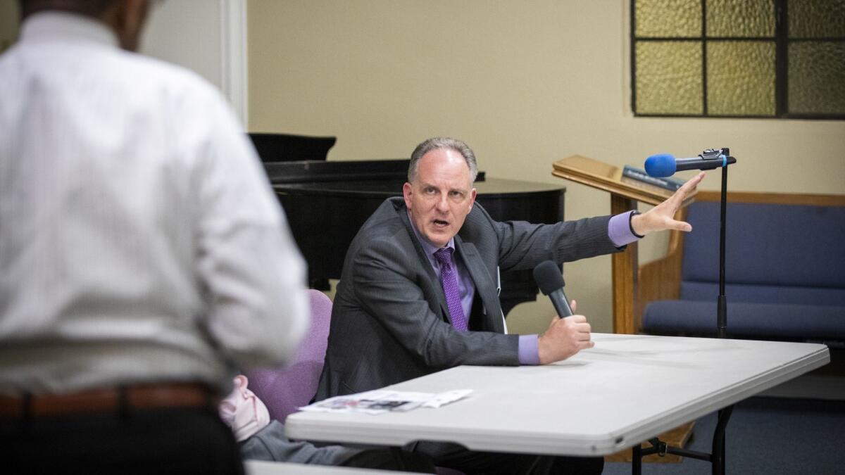 Max Huntsman, inspector general for L.A. County who is overseeing the Sheriff's Department, speaks at a town hall meeting in Compton on Thursday.