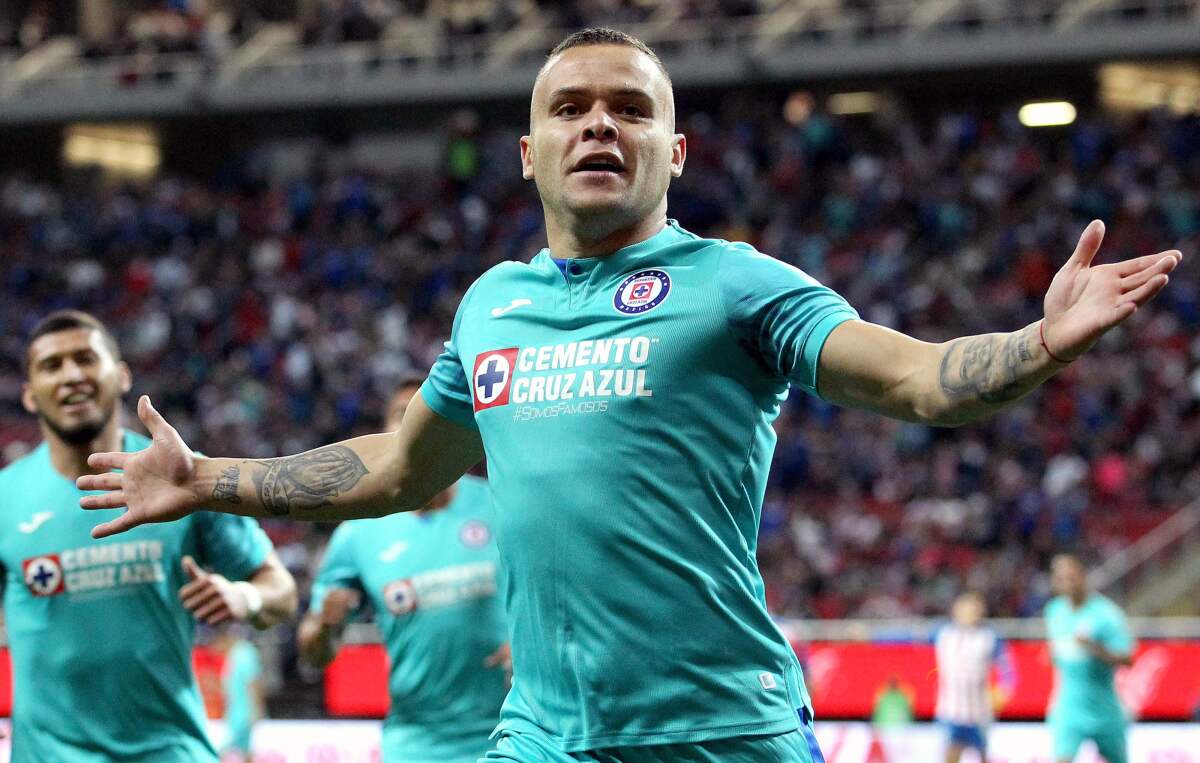 Jonathan Rodriguez of Cruz Azul celebrates his goal against Guadalajara during a Mexican Clausura tournament football match at Akron stadium in Guadalajara, Jalisco State, Mexico, on February 15, 2020. (Photo by Ulises Ruiz / AFP) (Photo by ULISES RUIZ/AFP via Getty Images) ** OUTS - ELSENT, FPG, CM - OUTS * NM, PH, VA if sourced by CT, LA or MoD **