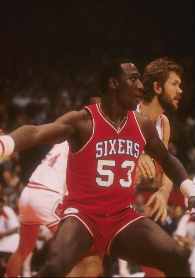 1979: Darryl Dawkins of the Philadelphia 76ers looks on during a game.