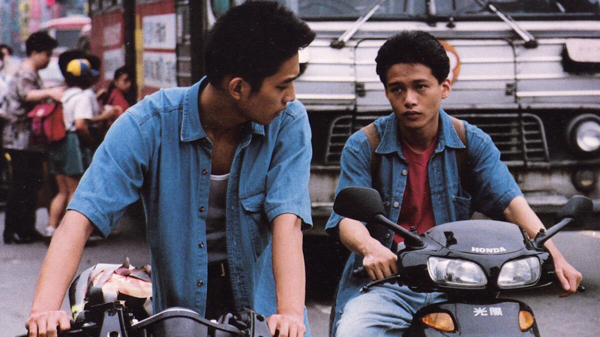 Ah-tze (Chen Chao-jun) and Hsiao-kang (Lee Kang-sheng) in "Rebels of the Neon God."