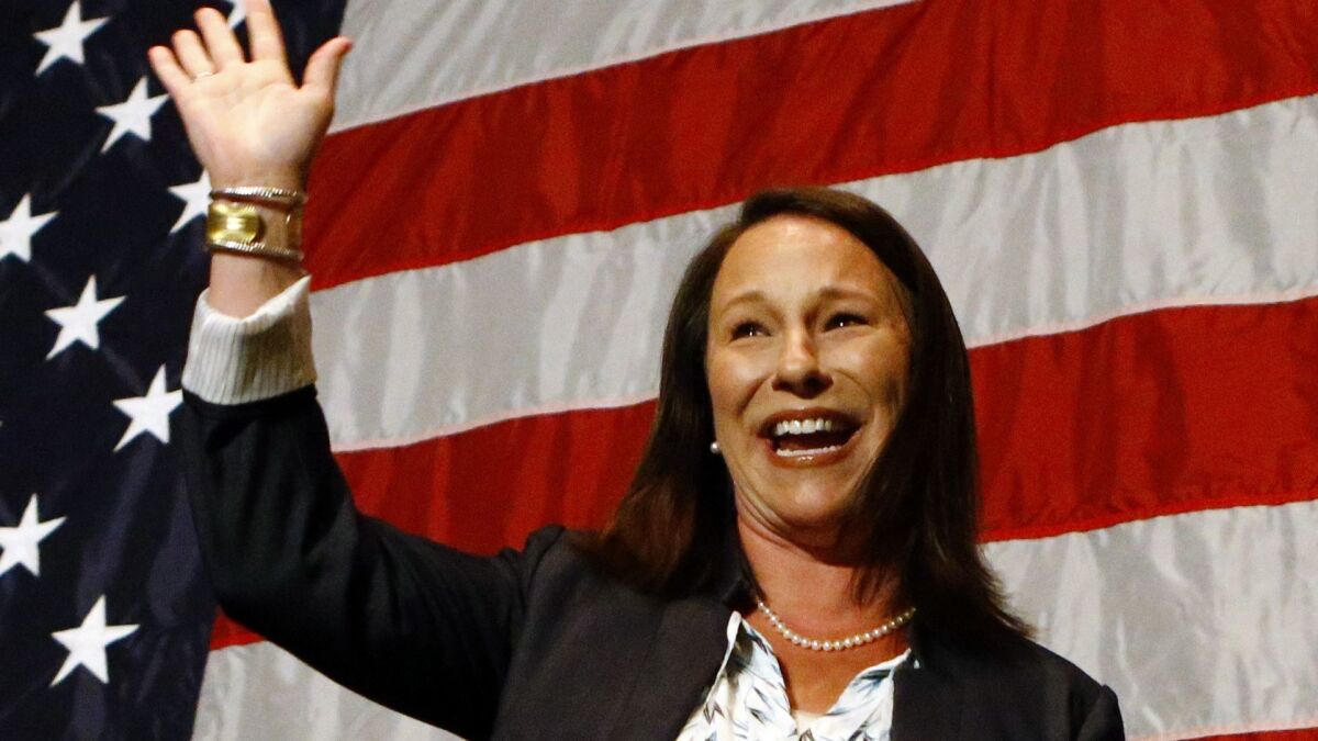 Alabama Rep. Martha Roby waves to supporters during the watch party as she wins the runoff election Tuesday in Montgomery, Ala.