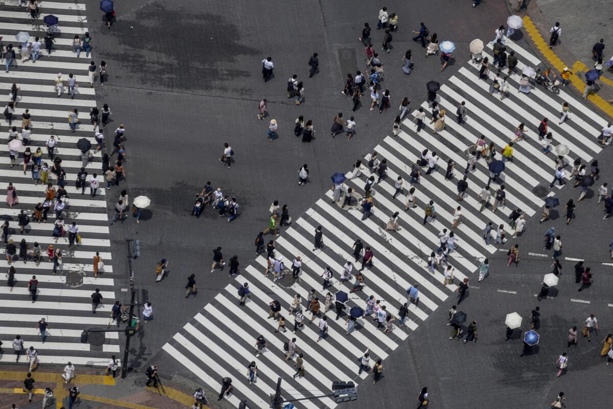 View from above of people in crosswalks