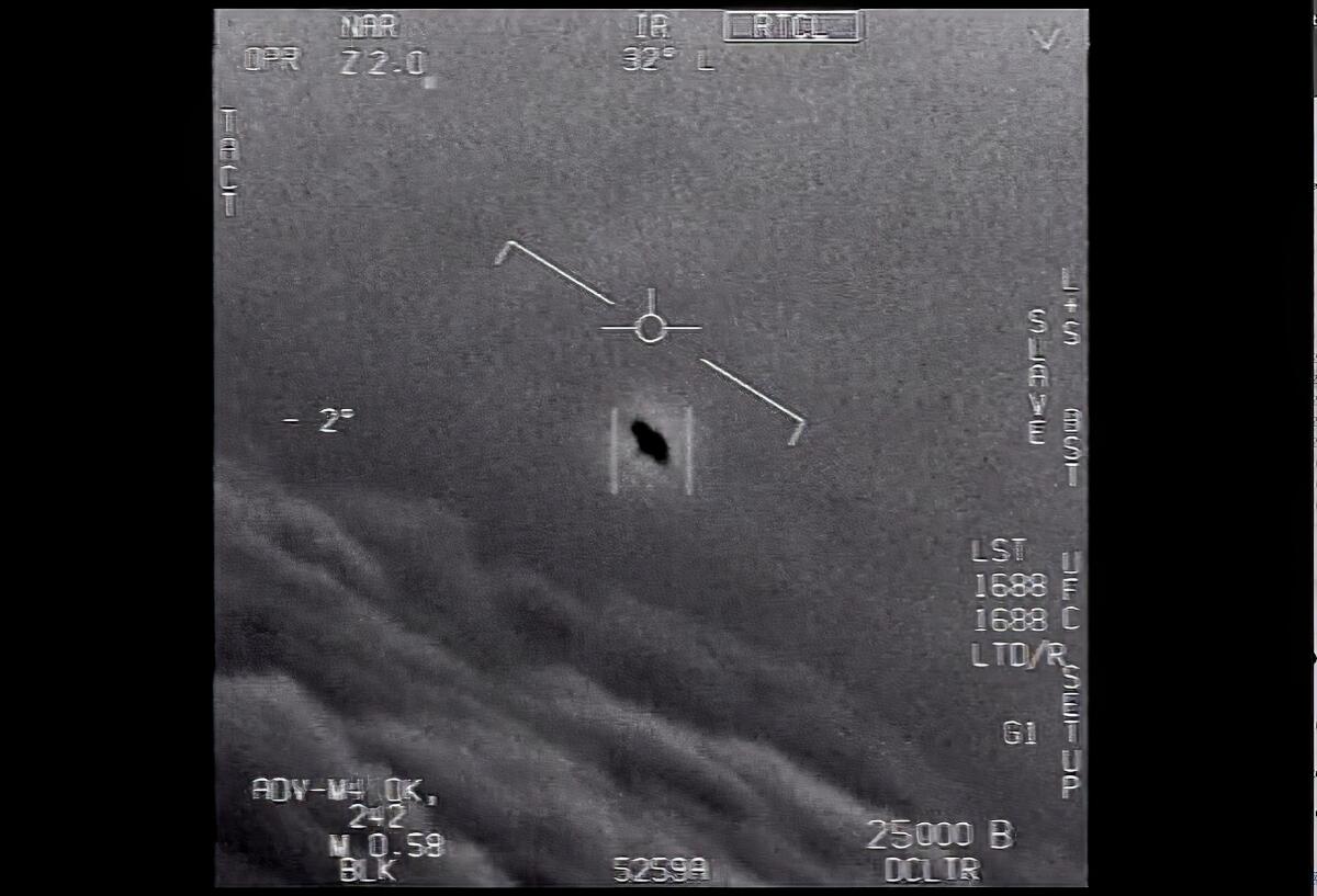 An image taken from an aircraft shows an unidentified object in the clouds.