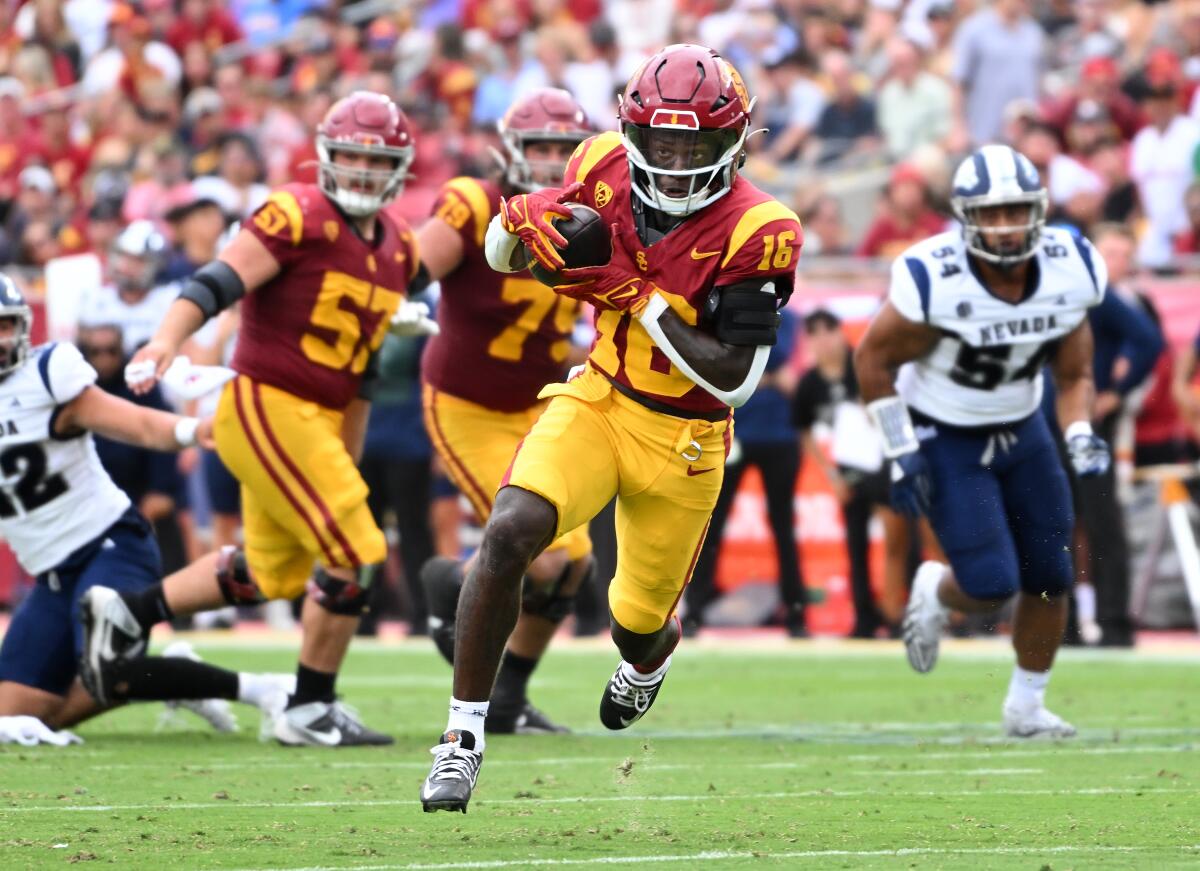 Los Angeles, California September 2, 2023-USC receiver Tahj Washington makes a catch.