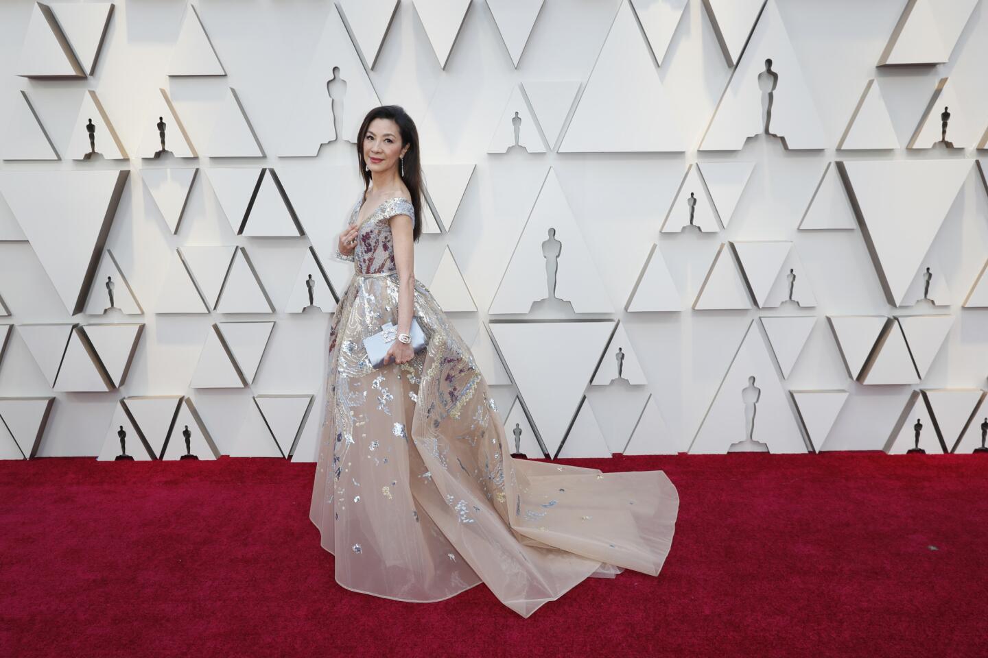 HIT: Michelle Yeoh is ever the matriarch in an off-the-shoulder evening gown embroidered with golden threads and sequins from Elie Saab Haute Couture.