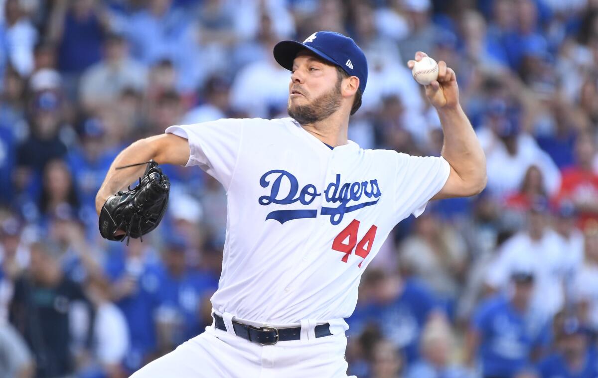 Dodgers pitcher Rich Hill throws a pitch in the first inning against the Red Sox in Game 4 of the World Series.