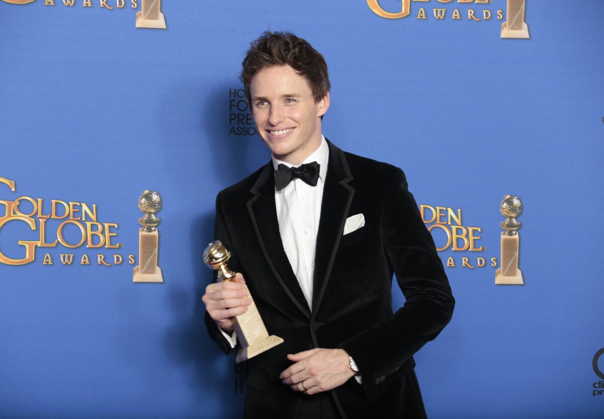 Eddie Redmayne in the press room with his lead actor in a drama award for his performance in "The Theory of Everything."