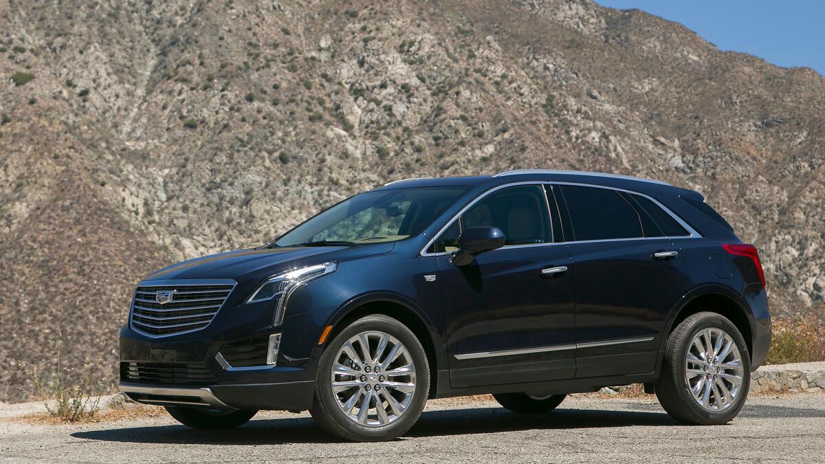 Cadillac's XT5 premium crossover, new for 2017, replaces the bestselling SRX and will now fight with BMW, Audi, Mercedes and others for upscale SUV buyers.
