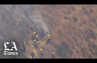 Brush fire burning in Malibu near PCH
