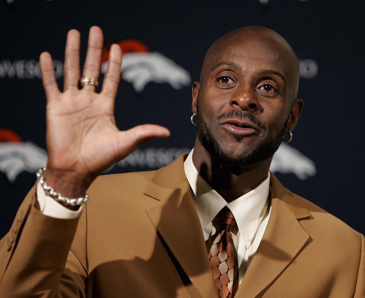 Jerry Rice waves goodbye after announcing his retirement at a new conference in 2005. Rice was inducted into the Pro Football Hall of Fame in 2010.