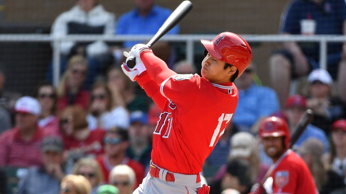 Angels' Shohei Ohtani swings at a pitch in the second inning of the spring training game against the Arizona Diamondbacks on Tuesday.