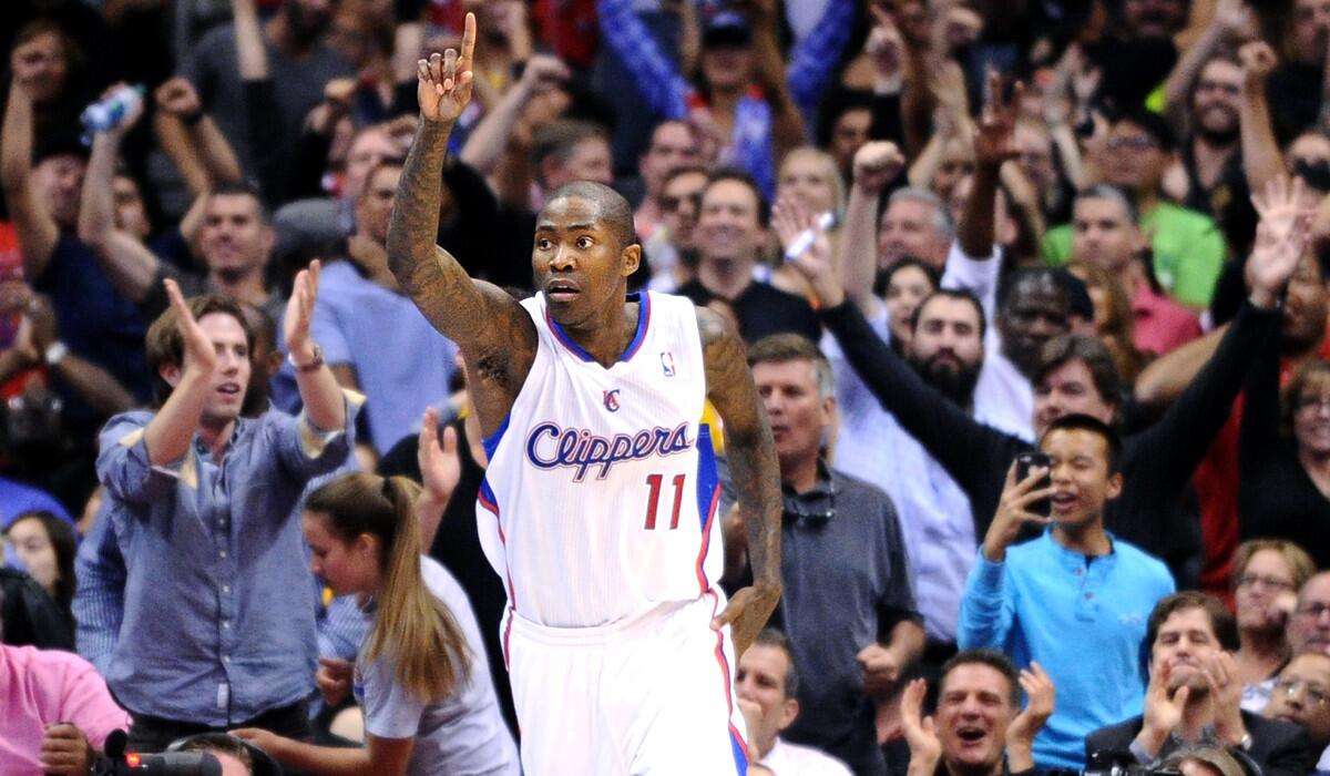 Clippers guard Jamal Crawford celebrates after making a shot against the Warriors during the playoffs last spring.