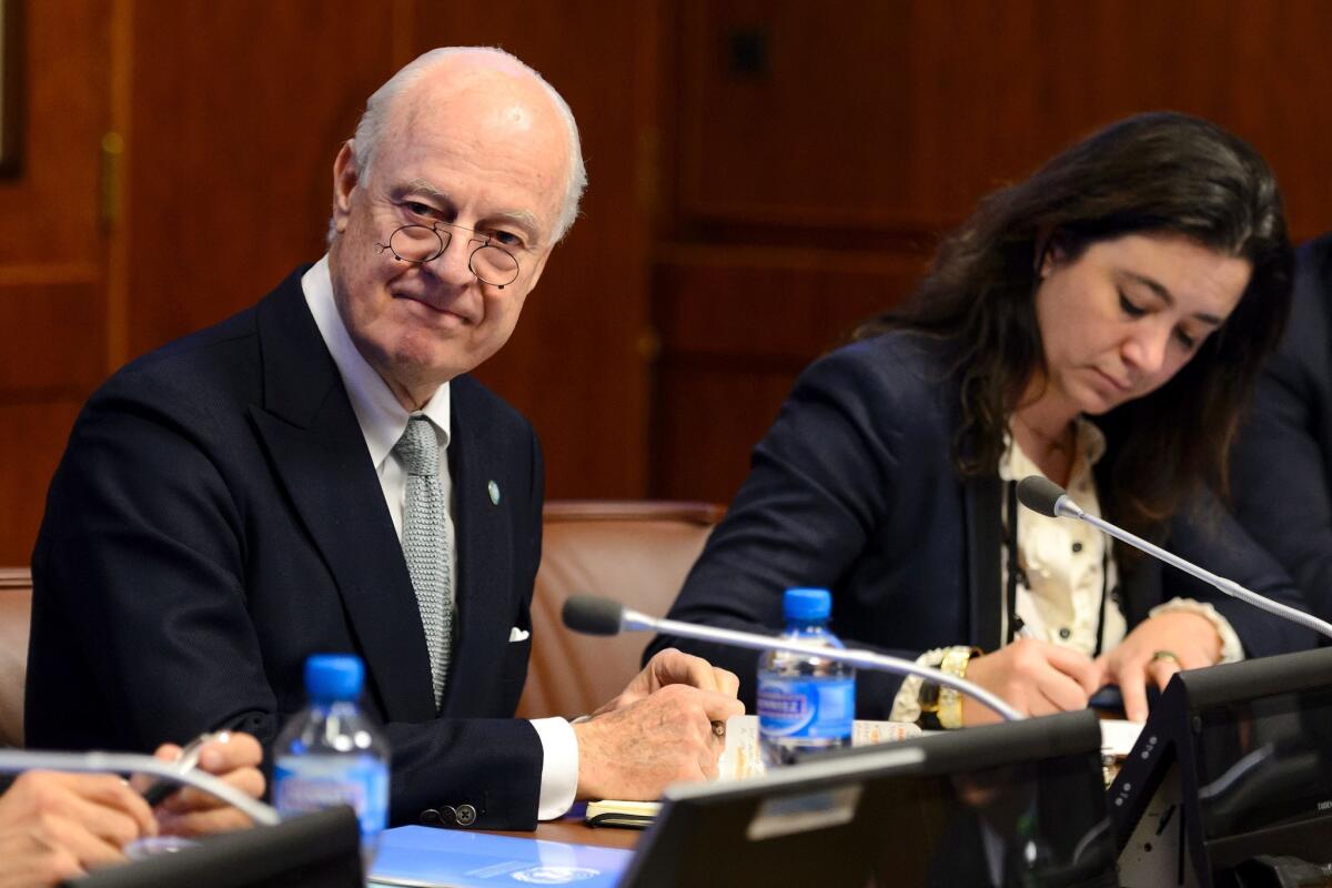 United Nations Syria envoy Staffan de Mistura, left, attends a meeting with ambassadors from the five permanent members of the U.N .Security Council in Geneva.