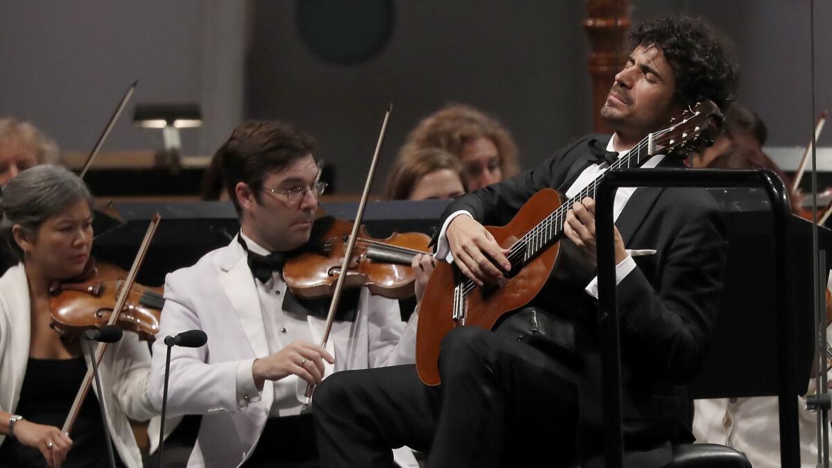 Guitarist Pablo Sáinz Villegas performs music from Spain with the Los Angeles Philharmonic Orchestra at the Hollywood Bowl on Thursday night.