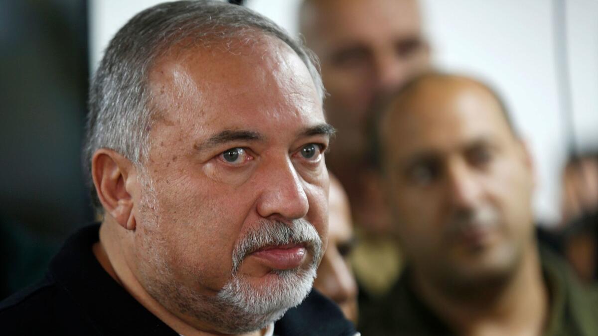 Israeli Defense Minister Avigdor Lieberman arrives for the inauguration of an underground military operation center in the Israeli settlement of Katzrin in the Golan Heights on April 10, 2018.