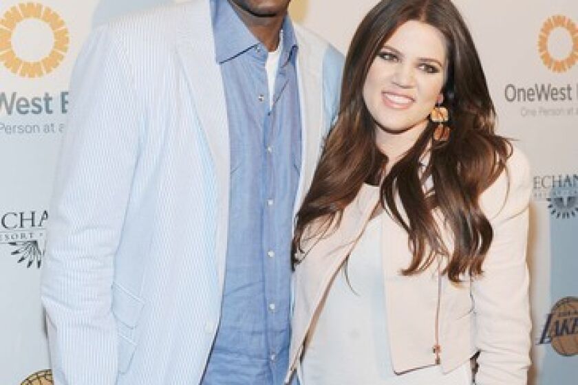 Lamar Odom and Khloe Kardashian at the Los Angeles Lakers Youth Foundation's Casino Night. The event was held at Staples Center's Lexus Club.