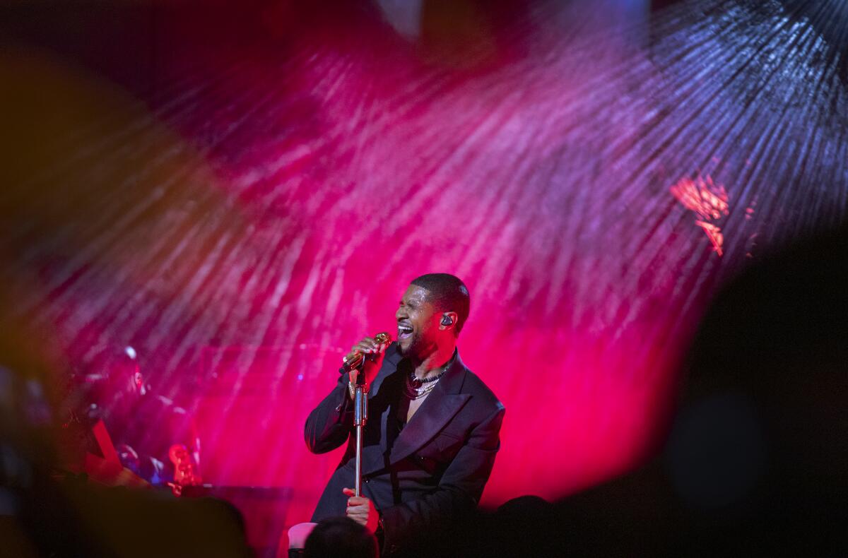 Usher performs at the "Chairman's Pre-Super Bowl Party" at SoFi Stadium 