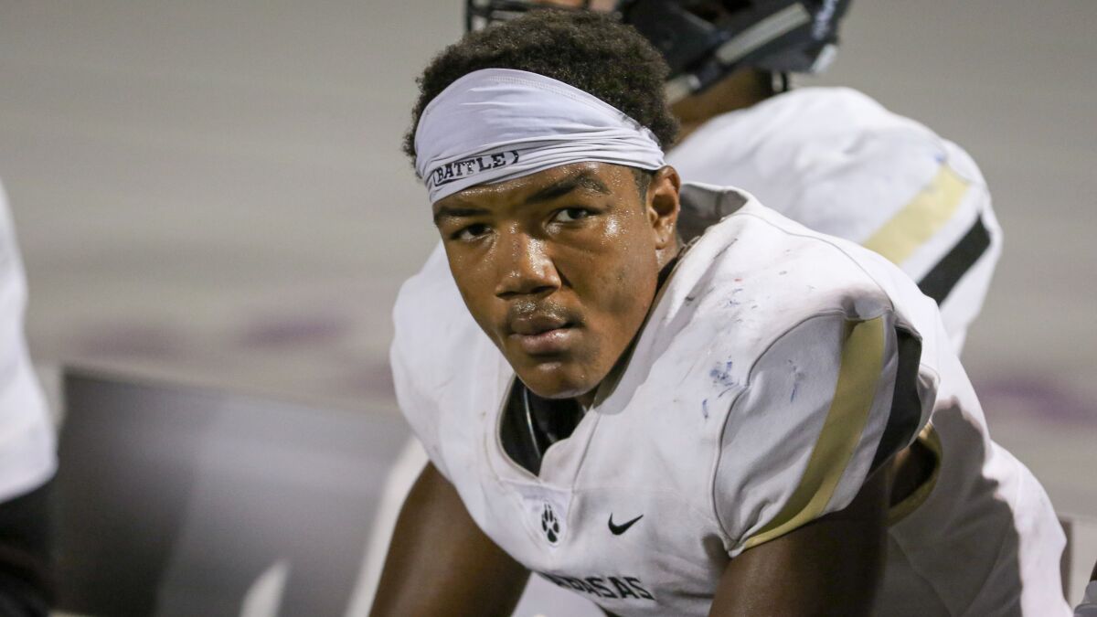 Calabasas defensive end Leshaun Bell looks on from the bench after ending a Rancho Cucamonga drive with a sack of quarterback CJ Stroud on Aug. 29.