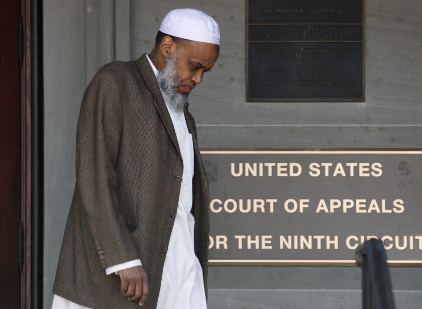 Portland Imam Mohamed Sheikh Abdirahman Kariye, who is one of 15 men who say their rights were violated because they are on the U.S. government's no-fly list, leaves the U.S. Court of Appeals following oral arguments on the ACLU No Fly List challenge, in Portland, Ore. A federal judge has ruled that the U.S. government violated the rights of 13 people on its no-fly list by depriving them of their constitutional right to travel, and gave them no adequate way to challenge their placement on the list.