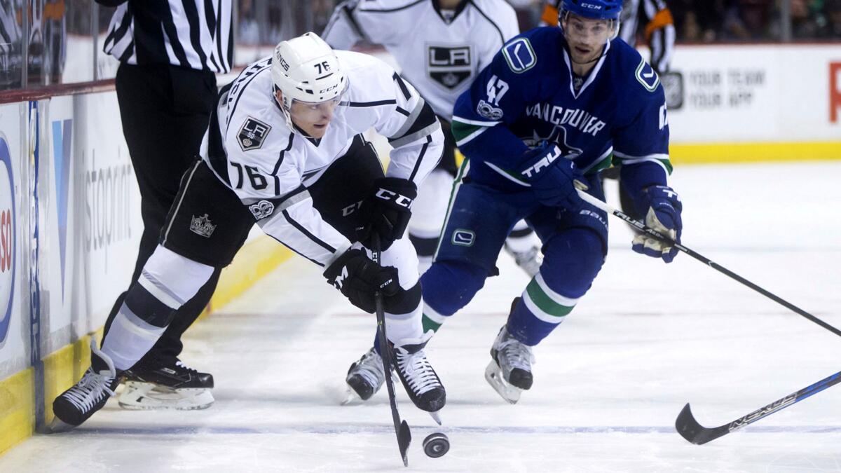 “I feel like I’ve been playing some pretty good games,” says Kings center Jonny Brodzinski, shown handling the puck against the Canucks last month.