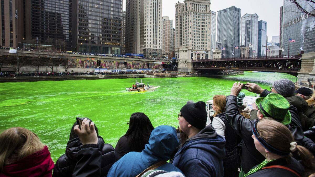 Thousands of people lined up in downtown Chicago to see the dyeing of the Chicago River, a St. Patrick's Day tradition that dates to 1962.