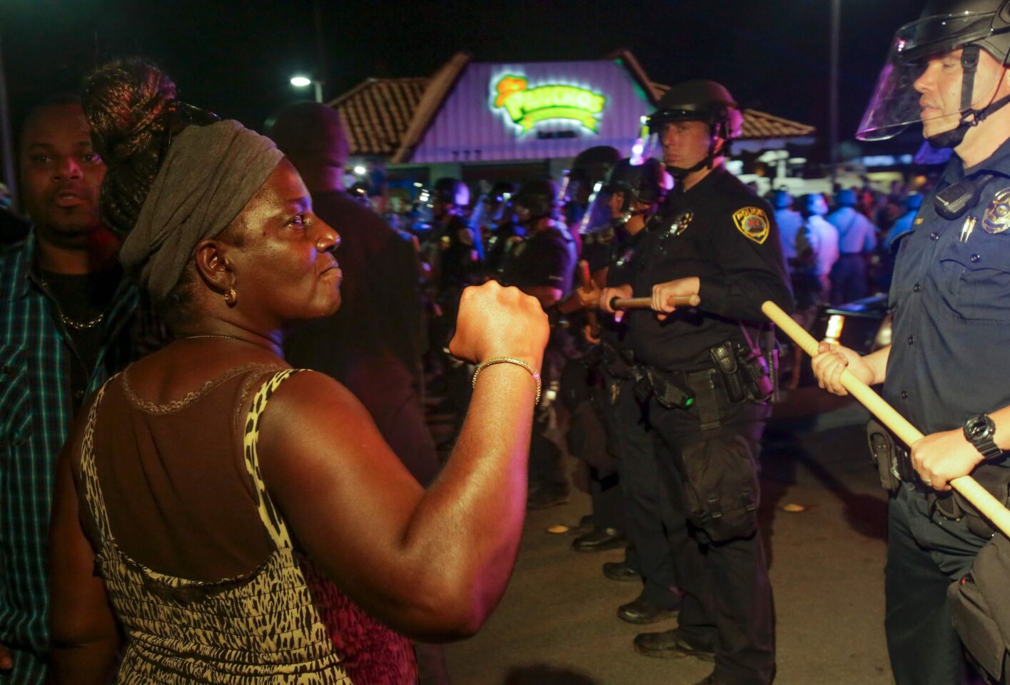 Protesters face off with police in El Cajon after the shooting of Alfred Olango.