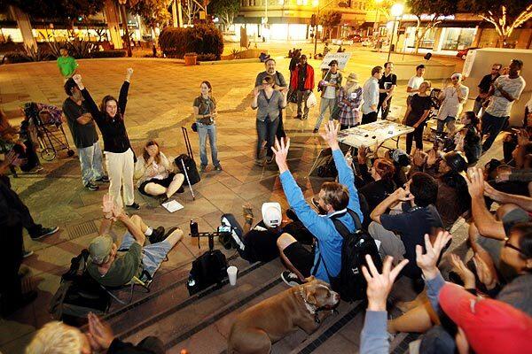 Members of the Occupy Los Angeles movement gather in Pershing Square to mark its first anniversary. Activities are scheduled through Monday.