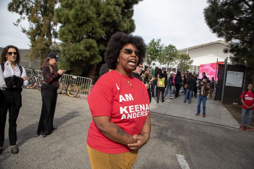 SANTA MONICA, CA - FEBRUARY 18: Patrisse Cullors speaks at protest/disruption at Frieze Los Angeles on Saturday, Feb. 18, 2023 in Santa Monica, CA. (Brian van der Brug / Los Angeles Times)