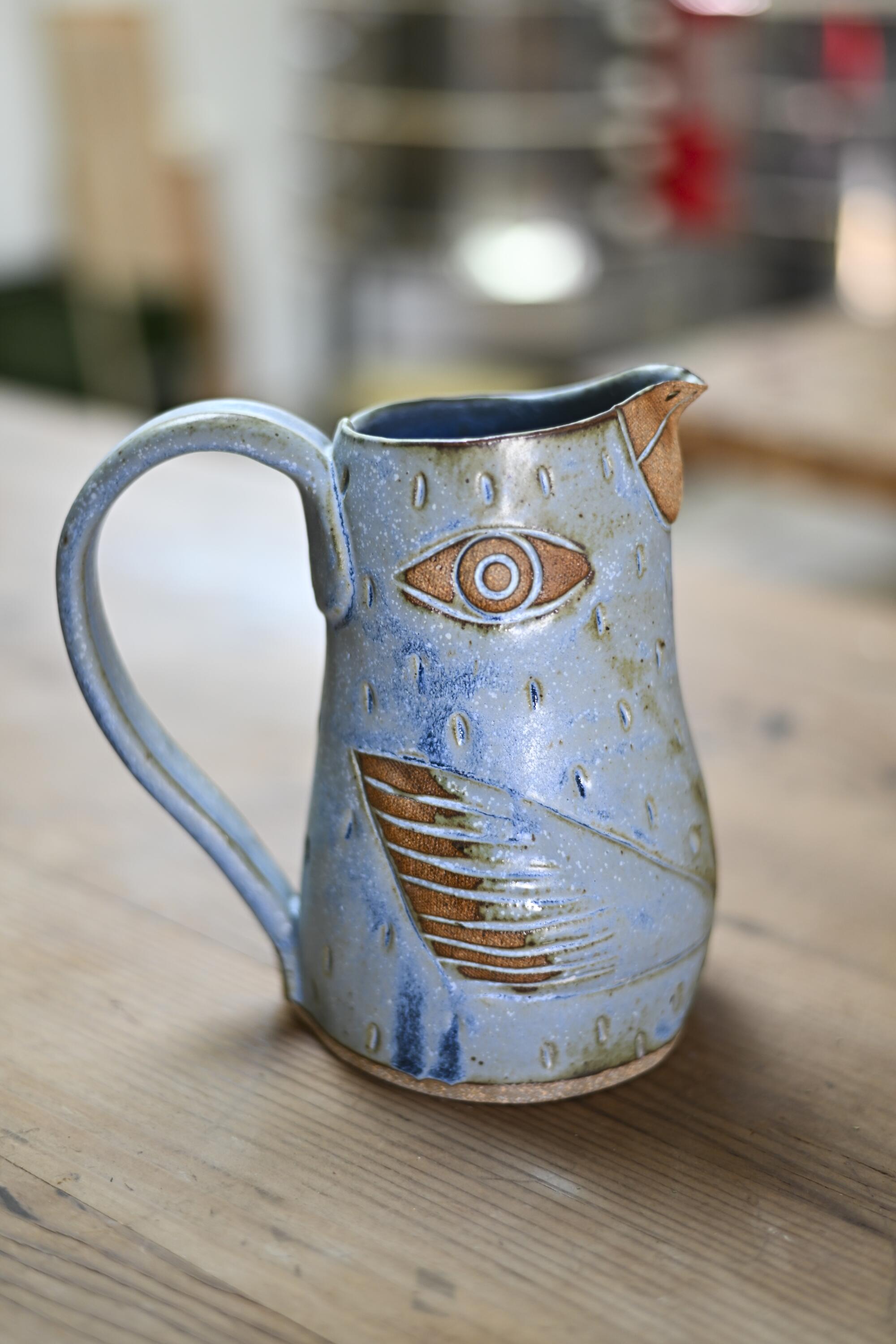Ceramic bird jar in blue.