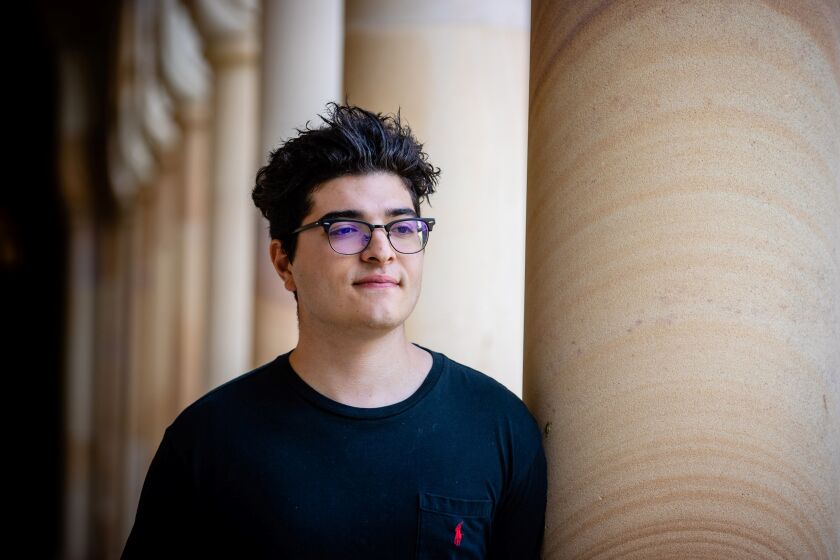 This photo taken on September 1, 2020 shows student Drew Pavlou posing for a photo on the campus of the University of Queensland in Brisbane. - When a Chinese foreign ministry spokesman personally denounced Pavlou at a recent press conference, it was just the next phase in an extraordinary campaign against the 21-year-old that has fuelled concerns over China's targeting of critics overseas. (Photo by Patrick HAMILTON / AFP) / TO GO WITH Australia-China-politics-demonstration-students,FOCUS by Holly ROBERTSON (Photo by PATRICK HAMILTON/AFP /AFP via Getty Images)