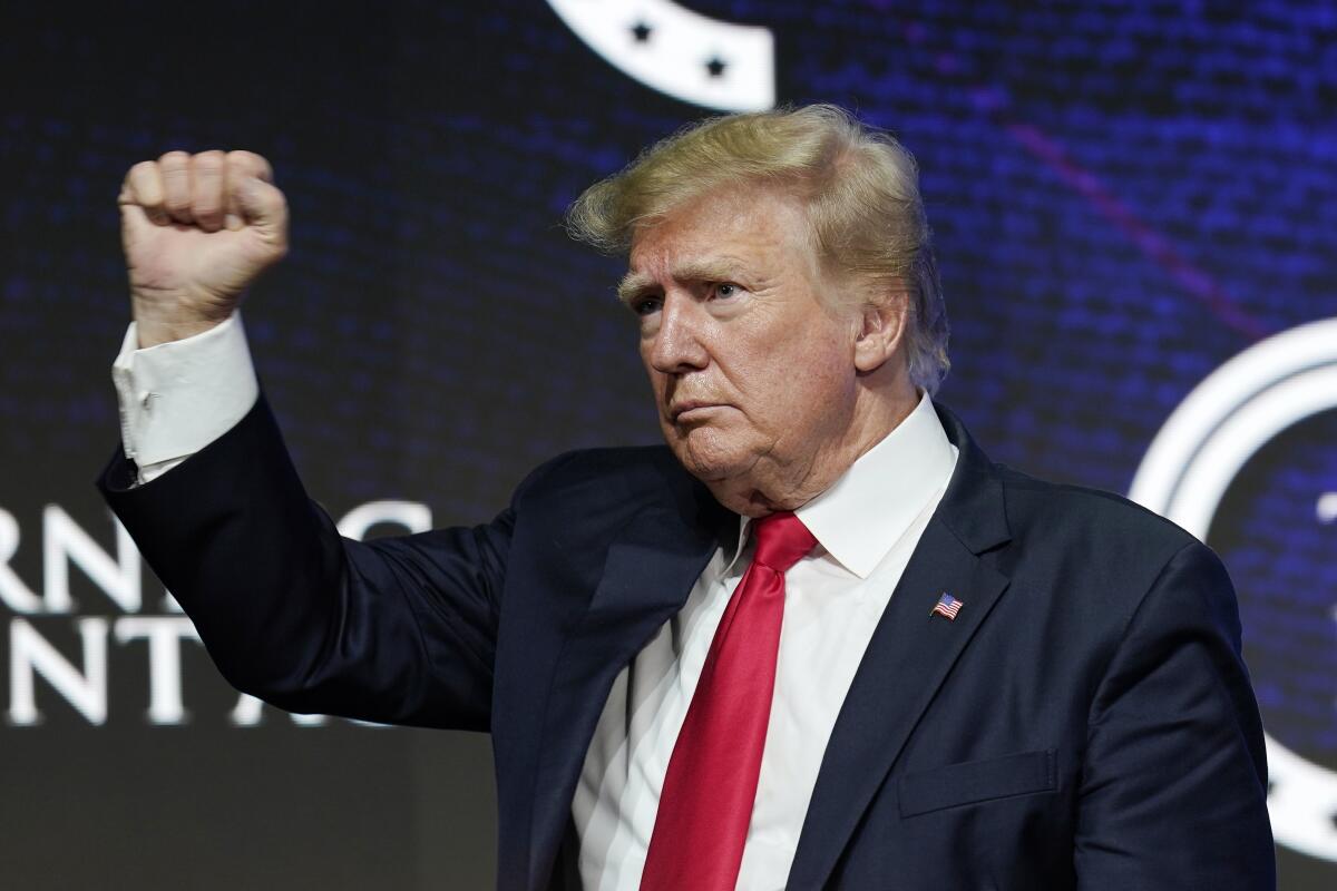Former President Trump gestures during an event in Phoenix in 2021. 