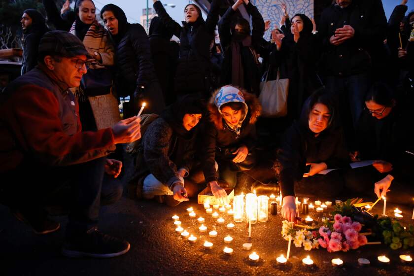 Iranians light candles for the victims of Ukraine International Airlines Boeing 737 during a gathering in front of the Amirkabir University in the capital Tehran, on January 11, 2020. - Iran said it "unintentionally" shot down a Ukrainian passenger jet, killing all 176 people aboard, in an abrupt about-turn after initially denying Western claims it was struck by a missile. President Hassan Rouhani said a military probe into the tragedy had found "missiles fired due to human error" brought down the Boeing 737, calling it an "unforgivable mistake". (Photo by - / AFP) (Photo by -/AFP via Getty Images) ** OUTS - ELSENT, FPG, CM - OUTS * NM, PH, VA if sourced by CT, LA or MoD **