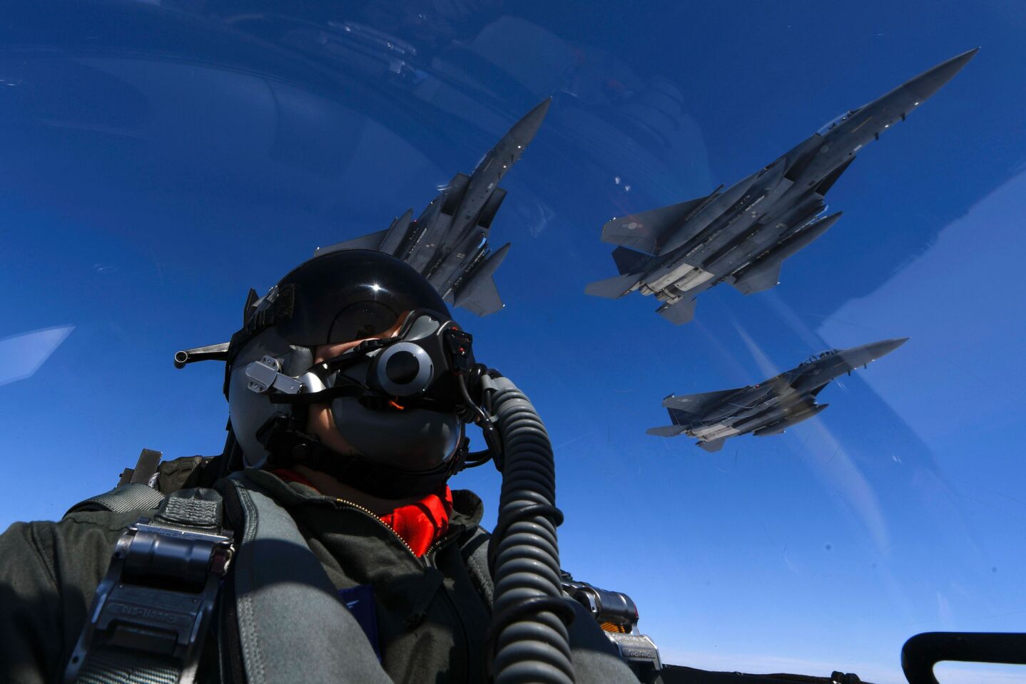 A U.S. Air Force pilot joins up with South Korean air force F-15s during a 10-hour mission from Andersen Air Force Base, Guam, into Japanese airspace and over the Korean Peninsula. North Korea on Aug. 8, 2017, said that it is considering strikes on U.S. strategic military installations in Guam with its intermediate-range ballistic missiles, state news agency KCNA reported.