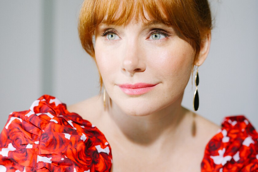 Los Angeles, CA - June 04: Actor and filmmaker Bryce Dallas Howard poses for a portrait at the Four Seasons Hotel on Saturday, June 4, 2022 in Los Angeles, CA. She is reprising her role in the dino sequel "Jurassic World: Dominion." Offscreen, Howard also continues to build her resume as a director ("The Mandalorian," "The Book of Boba Fett" and the upcoming "Flight of the Navigator" remake). (Dania Maxwell / Los Angeles Times)