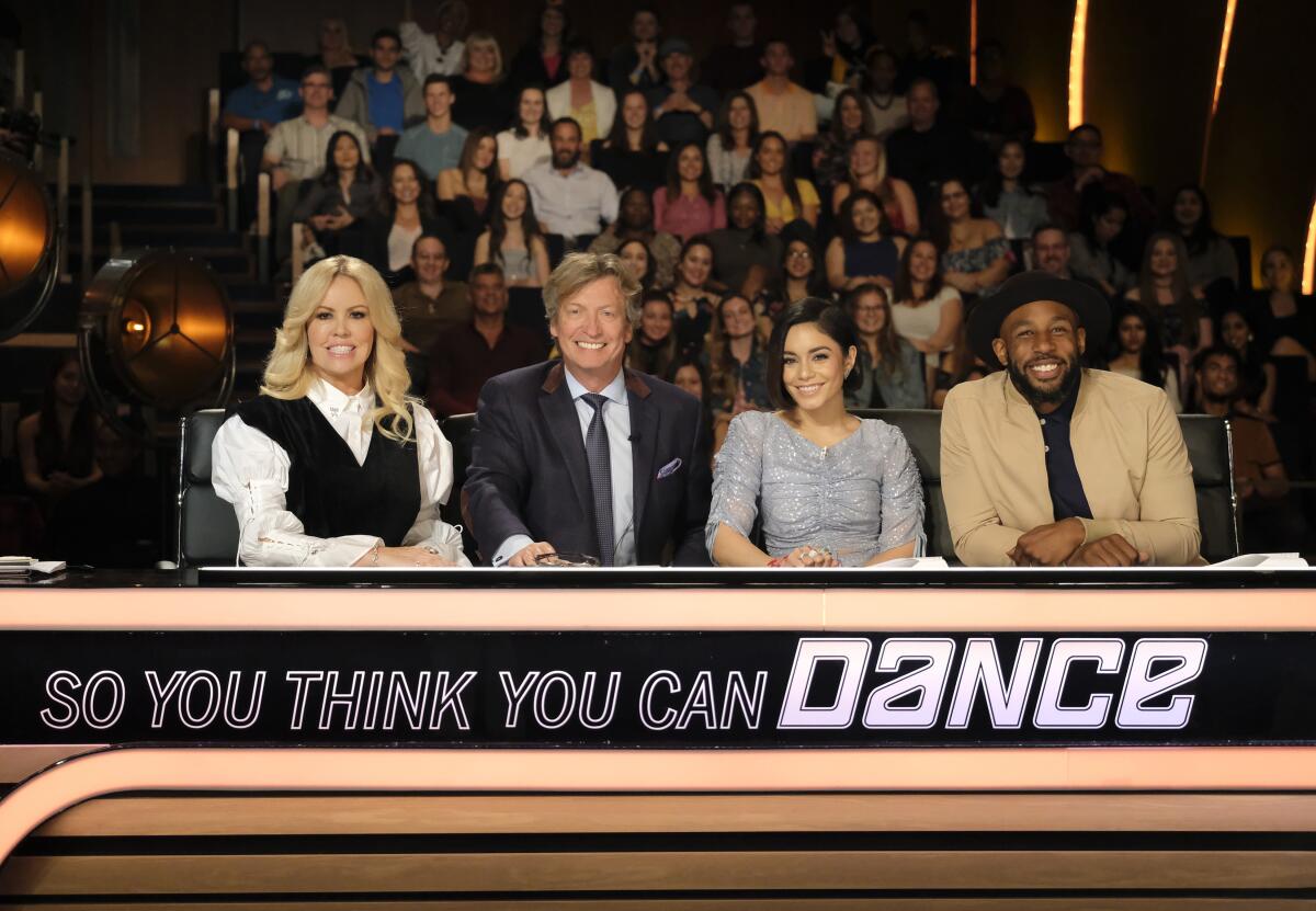 panel of four judges behind a desk with words "so you think you can dance" 