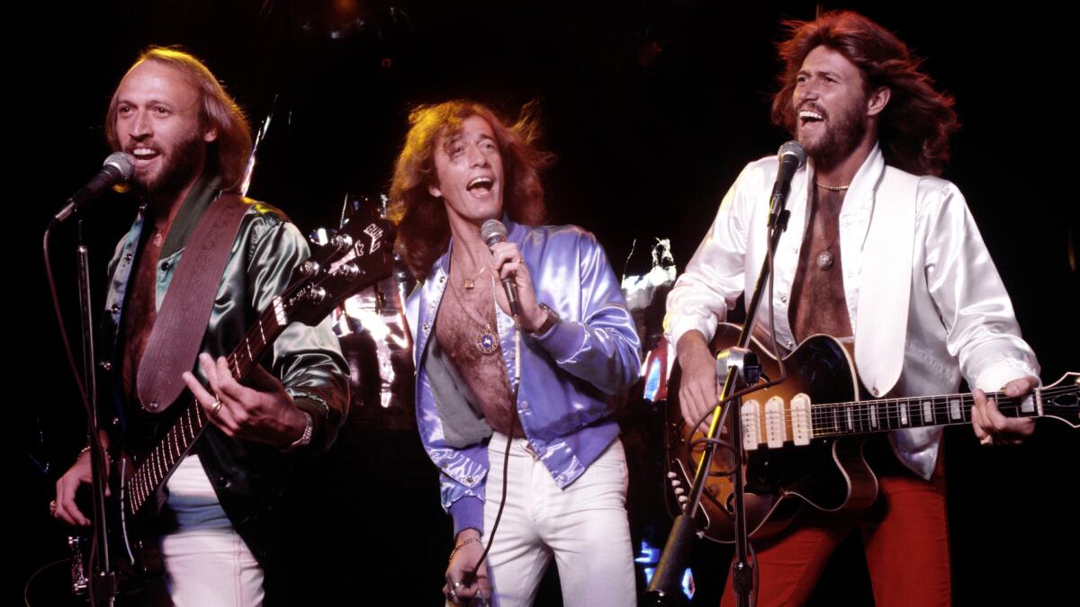 Maurice Gibb, left, Robin Gibb and Barry Gibb in "The Bee Gees: How Can You Mend a Broken Heart" on HBO. 