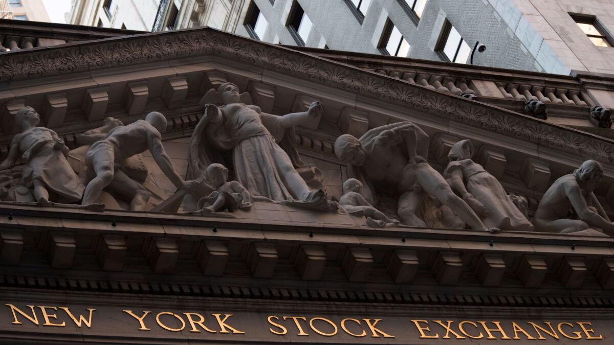 This Tuesday, Oct. 25, 2016, file photo shows the New York Stock Exchange at sunset, in lower Manhattan.